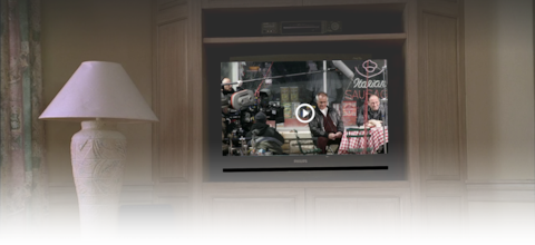 Sopranos living room tv with image of behind the scenes screenshot