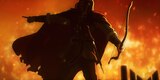 Wulf holds a bow in his left hand and points at something out of frame with his right hand. He is backlit by a raging fire.