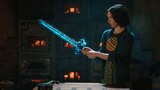 Natlie stands in the forge of Steve’s Secret Stash, and holds a diamond sword.