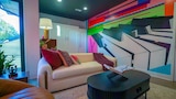 Primary Bedroom and Multifunctional Guest Room