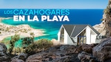 Los cazahogares en la playa