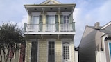 Newlyweds in New Orleans Debating Shotgun vs. Victorian